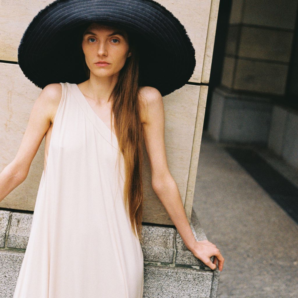 Magata SS 24 Berlin campaign long one slip beige dress black hemp hat